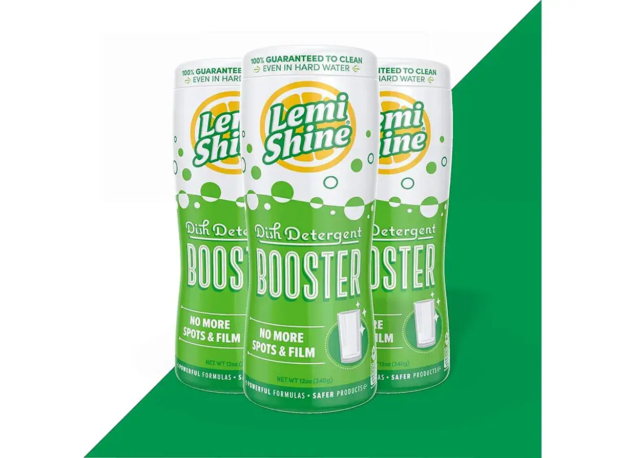 Three bottles of Lemi Shine dish detergent with green and white packaging, emphasizing eco-friendly cleaning and stain removal.